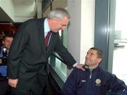 17 May 2002; An Taoiseach Bertie Ahern TD, meets Republic of Ireland captain Roy Keane at Dublin Airport prior to the team's departure to their base on Saipan island in preparation tor the World Cup 2002 in Japan and Korea. Soccer. Picture credit; David Maher / SPORTSFILE *EDI*