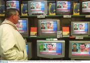 23 May 2002; Mr. Brendan Raythorn, from Ringsend, watches SKY NEWS reports on Roy Keane in Dublin's city centre. Soccer. Cup2002. Picture credit; Damien Eagers / SPORTSFILE