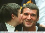 13 January 2002; Legendary soccer star Roy Keane linked up with irish and international children to launch the &quot;Support an Athlete Programme&quot;, sponsored by RTE, the main public fundraising initiative of the 2003 Special Olympic World Games. Pictured kissing Roy on the cheek is Anne Hickey from Carlow, and who is a GlobalMessenger for the 2003 Special Olympics World Games. 2003SOWG. Picture credit; Brendan Moran / SPORTSFILE