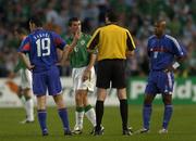 7 September 2005; Roy Keane remonstrates with referee Herbert Fandel after he issued his team-mate Clinton Morrison with a yellow card. FIFA 2006 World Cup Qualifier, Group 4, Republic of Ireland v France, Lansdowne Road, Dublin. Picture credit; Brian Lawless / SPORTSFILE