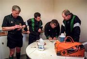 4 Janurary 1998; Referees Frank Ward, left, and Eamonn Whelan, second from right, with linesmen Liam Torett and John Carroll, right, during the half time break in the O'Byrne cup game at Aughrim in Wicklow. Photo by Ray McManus/Sportsfile