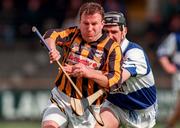 12 April 1998; Adrian Ronan of Kilkenny in action against Paul Cuddy of Laois during the National Hurling League match between Kilkenny and Laois at Nowlan Park in Kilkenny. Photo by Matt Browne/Sportsfile