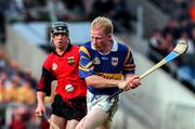 26 July 1997; Aidan Ryan of Tipperary in action against Stephen Murray of Down during the GAA All-Ireland Senior Hurling Championship Quarter-Final match between Tipperary and Down at St. Tiernach's Park in Clones, Monaghan. Photo by David Maher/Sportsfile