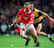 8 June 1997; Alan Cummins of Cork in action against PJ O'Connell of Clare during the GAA Munster Senior Hurling Championship Semi-Final match between Clare and Cork at the Gaelic Grounds, Limerick. Photo by Ray McManus/Sportsfile
