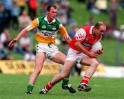 29 June 1997; Alan Rooney of Louth in action against John Kenny of Offaly during the Leinster GAA Senior Football Championship Semi-Final match between Offaly and Louth at Páirc Tailteann in Navan, Meath. Photo by Ray McManus/Sportsfile