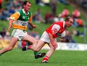29 June 1997; Alan Rooney of Louth in action against John Kenny of Offaly during the Leinster GAA Senior Football Championship Semi-Final match between Offaly and Louth at Páirc Tailteann in Navan, Meath. Photo by Ray McManus/Sportsfile