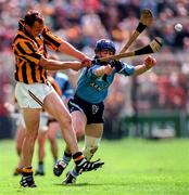 22 June 1997; Andy Comerford of Kilkenny clears downfield from Paddy Brady of Dublin during the Leinster Senior Hurling Championship Semi-Final match between Kilkenny and Dublin at Croke Park in Dublin. Photo by Ray McManus/Sportsfile