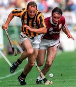 27 July 1997; Andy Comerford of Kilkenny in action against Liam Burke of Galway during the GAA All-Ireland Senior Hurling Championship Quarter-Final match between Kilkenny and Galway at Semple Stadium in Thurles, Tipperary. Photo by Matt Browne/Sportsfile