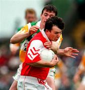 29 June 1997; Brendan Kerin of Louth in action against Ciaran McManus of Offaly during the Leinster GAA Senior Football Championship Semi-Final match between Offaly and Louth at Páirc Tailteann in Navan, Co Meath. Photo by Ray McManus/Sportsfile