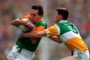 16 August 1997; Brendan Reilly of Meath in action against Larry Carroll of Offaly during the Leinster GAA Senior Football Championship Final match between Meath and Offaly at Croke Park in Dublin. Photo by Ray McManus/Sportsfile