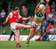 29 June 1997; Cathal O'Hanlon of Louth in action against Larry Carroll of Offaly during the Leinster GAA Senior Football Championship Semi-Final match between Offaly and Louth at Páirc Tailteann in Navan, Meath. Photo by Ray McManus/Sportsfile