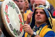 3 September 1995; A Clare fan plays a bodhran in the Canal End during the All-Ireland Senior Hurling Championship Final match between Clare and Offaly at Croke Park in Dublin. Photo by Brendan Moran/Sportsfile
