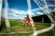 8 June 1997; Steven McDonagh celebrates scoring a goal against Ger Cunningham of Cork during the GAA Munster Senior Hurling Championship Semi-Final match between Clare and Cork at the Gaelic Grounds in Limerick. Photo by Ray McManus/Sportsfile