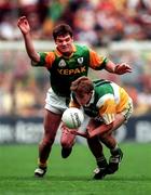 16 August 1997; Colm Quinn of Offaly in action against P.J Gillic of Meath during the Leinster GAA Senior Football Championship Final match between Meath and Offaly at Croke Park in Dublin. Photo by Ray McManus/Sportsfile
