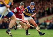 12 May 1996; Conal Bonnar of Tipperary in action against Joe Conney of Galway during the National Hurling League Final match between Galway and Tipperary at the Gaelic Grounds in Limerick. Photo by Ray McManus/Sportsfile