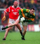 4 May 1997; Seamus Moynihan of Kerry gets away from Brian Corcoran of Cork during the National Football League Final match between Cork and Kerry at Páirc Uí Chaoimh in Cork. Photo by Ray McManus/Sportsfile
