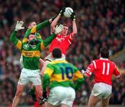 4 May 1997; Damien O'Neill of Cork beats Dara O'Sé and William Kirby of Kerry to the ball during the National Football League Final match between Cork and Kerry at Páirc Uí Chaoimh in Cork. Photo by Ray McManus/Sportsfile