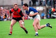 7 July 1996; Damien O'Reilly of Cavan in action against Mickey Linden of Down during the Ulster Senior Football Championship Semi-Final match between Cavan and Down at St Tiernach's Park in Clones, Monaghan. Photo by Ray McManus/Sportsfile