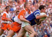 20 July 1997; Damien O'Reilly of Cavan in action against Johnny McBride of Derry during the Ulster GAA Football Senior Championship Final match between Cavan and Derry at St. Tiernach's Park in Clones, Monaghan. Photo by David Maher/Sportsfile