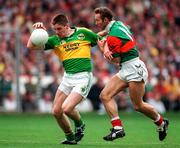27 September 1997; Darragh O Sé of Kerry is tackled by Colm McManaman of Mayo during the GAA Football All-Ireland Senior Championship Final match between Kerry and Mayo at Croke Park in Dublin. Photo by Brendan Moran/Sportsfile