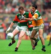 31 August 1997; David Heaney of Mayo fights for possession against Roy Malone of Offaly during the GAA Football All-Ireland Senior Championship Semi-Final match between Mayo and Offaly at Croke Park in Dublin. Photo by Ray McManus/Sportsfile