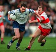12 April 1998; Declan Smith of Monaghan in action against Johnny McBride of Derry during the National Football League Semi Final match between Derry and Monaghan at Croke Park in Dublin. Photo by Ray McManus/Sportsfile