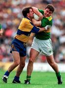 20 July 1997; Denis O'Dwyer of Kerry in action against John Enright of Clare during the GAA Munster Senior Football Championship Final match between Kerry and Clare at LIT Gaelic Grounds in Limerick. Photo by Matt Browne/Sportsfile