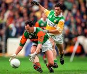 31 August 1997; Dermot Flanagan of Mayo fights for possession against Vinny Claffey of Offaly during the GAA Football All-Ireland Senior Championship Semi-Final match between Mayo and Offaly at Croke Park in Dublin. Photo by Ray McManus/Sportsfile