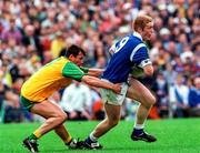 22 June 1997; Dermot McCabe of Cavan in action against John Joe Doherty of Donegal during the Ulster GAA Football Senior Championship Semi-Final match between Cavan and Donegal at St Tiernach's Park in Clones, Monaghan. Photo by David Maher/Sportsfile