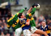19 May 1996; Derry Foley of Tipperary in action against Dara O'Sé and Maurice Fitzgerald of Kerry during the Munster Senior Football Championship Quarter-Final match between Tipperary and Kerry at Ned Hall Park in Clonmel, Tipperary. Photo by Brendan Moran/Sportsfile