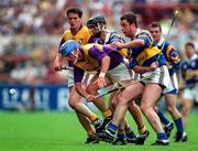17 August 1997; Eugene Furlong of Wexford, in a race for possession with Brian O'Meara, right, and Thomas Dunne of Tipperary during the GAA All-Ireland Senior Hurling Championship Semi-Final match between Tipperary and Wexford at Croke Park in Dublin. Photo by Ray McManus/Sportsfile