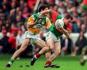 31 August 1997; Fergal Costello of Mayo in action against Vinny Claffey of Offaly during the GAA Football All-Ireland Senior Championship Semi-Final match between Mayo and Offaly at Croke Park in Dublin. Photo by Ray McManus/Sportsfile