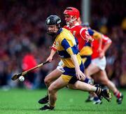 8 June 1997; Frank Lohan of Clare in action against Sean McGrath of Cork during the GAA Munster Senior Hurling Championship Semi-Final match between Clare and Cork at the Gaelic Grounds in Limerick. Photo by Ray McManus/Sportsfile