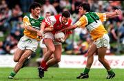 29 June 1997; Gareth O'Neill of Louth is put under pressure by Vinny Claffey and Roy Malone of Offaly during the Leinster GAA Senior Football Championship Semi-Final match between Offaly and Louth at Páirc Tailteann in Navan, Co Meath. Photo by Ray McManus/Sportsfile
