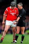 8 June 1997; Ger Manley of Cork with Referee Pat O'Connor during the GAA Munster Senior Hurling Championship Semi-Final match between Clare and Cork at the Gaelic Grounds in Limerick. Photo by Ray McManus/Sportsfile