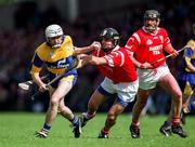 8 June 1997; Ger O'Loughlin of Clare in action against John O'Driscoll of Cork during the GAA Munster Senior Hurling Championship Semi-Final match between Clare and Cork at the Gaelic Grounds in Limerick. Photo by Ray McManus/Sportsfile