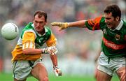 31 August 1997; James Horan of Mayo in action against John Kenny of Offaly during the GAA Football All-Ireland Senior Championship Semi-Final match between Mayo and Offaly at Croke Park in Dublin. Photo by Matt Browne/Sportsfile
