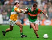 31 August 1997; James Nallen of Mayo in action against Roy Malone of Offaly during the GAA Football All-Ireland Senior Championship Semi-Final match between Mayo and Offaly at Croke Park in Dublin. Photo by Ray McManus/Sportsfile