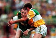 16 August 1997; Jimmy McGuinnesss of Meath in action against Ciaran McManus of Offaly during the Leinster GAA Senior Football Championship Final match between Meath and Offaly at Croke Park in Dublin. Photo by Ray McManus/Sportsfile