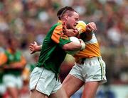 16 August 1997; Jimmy McGuinnesss of Meath in action against Ciaran McManus of Offaly during the Leinster GAA Senior Football Championship Final match between Meath and Offaly at Croke Park in Dublin. Photo by Ray McManus/Sportsfile