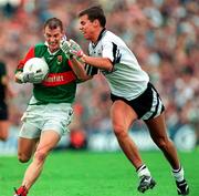 3 August 1997; John Casey of Mayo in action against Nigel Clancy of Sligo during the GAA Connacht Senior Football Championship Final match between Mayo and Sligo at Dr Hyde Park in Roscommon. Photo by Damien Eagers/Sportsfile