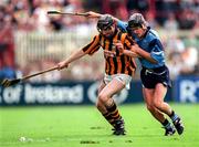 22 June 1997; John Costelloe of Kilkenny in action against Paul O'Donoghue of Dublin during the Leinster Senior Hurling Championship Semi-Final match between Kilkenny and Dublin at Croke Park in Dublin. Photo by Ray McManus/Sportsfile