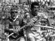 2 July 1989; John Leahy of Tipperary in action against Timmy Sheehan of Waterford during the Munster Senior Hurling Championship Final match between Tipperary and Waterford at Páirc Uí Chaoimh in Cork. Photo by Ray McManus/Sportsfile