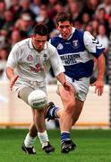 8 June 1997; Johnny McDonald of Kildare in action against Colm Burke of Laois during the Leinster GAA Senior Football Championship Quarter-Final match between Laois and Kildare at Croke Park in Dublin. Photo by David Maher/Sportsfile