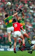 21 July 1996; Maurice Fitzgerald, right, and Dara O'Sé of Kerry in action against Cork's Liam Honohan, 8, during the Munster Football Final match between Cork and Kerry at Páirc Uí Chaoimh in Cork. Photo by Ray McManus/Sportsfile