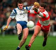 12 April 1998; Padraig McShane of Monaghan in action against Anthony Tohill of Derry during the National Football League Semi Final match between Derry and Monaghan at Croke Park in Dublin. Photo by Ray McManus/Sportsfile