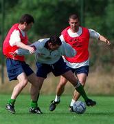 3 September 1998; Alan McLoughlin in action against Denis Irwin, left, and Roy Keane during a Republic of Ireland Training Session at Clonshaugh in Dublin. Photo by Matt Browne/Sportsfile