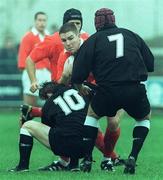 26 September 1998; Brian Roche of Munster is tackled by Matthew McCarthy, 10, and Brett Sinkinson of Neath during the Heineken Cup Pool B Round 2 match between Munster and Neath at Musgrave Park in Cork. Photo by Matt Browne/Sportsfile