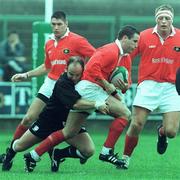 26 September 1998; Brian Roche of Munster is tackled by Ian Jones of Neath during the Heineken Cup Pool B Round 2 match between Munster and Neath at Musgrave Park in Cork. Photo by Matt Browne/Sportsfile