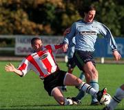 25 October 1998; Clive Delaney of UCD is tackled by Sean Horgan of Derry City during the Harp Lager National League Premier Division match between UCD and Derry City at the Belfield Bowl in Dublin. Photo by Matt Browne/Sportsfile